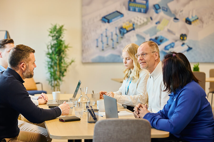VEO people at the office talking